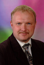 Андрющенко Андрій Миколайович, директор ВСП «Тальнівський будівельно-економічний фаховий коледж Уманського національного університету садівництва», кандидат економічних наук, доцент